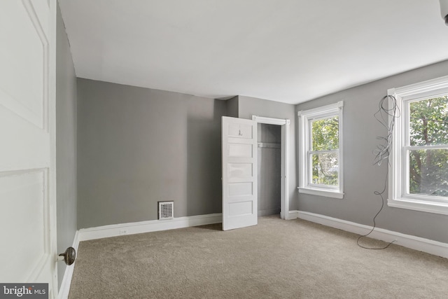 unfurnished bedroom featuring carpet flooring