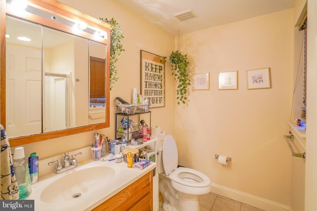 bathroom with walk in shower, tile patterned flooring, vanity, and toilet