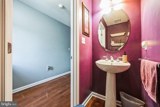 bathroom featuring hardwood / wood-style flooring