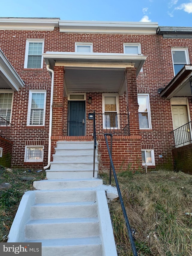 view of property featuring a porch