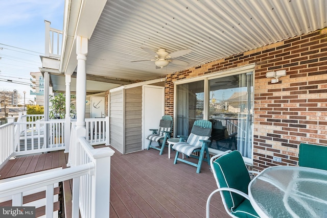 deck featuring a ceiling fan