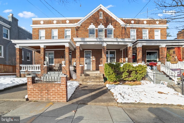 view of property featuring a porch