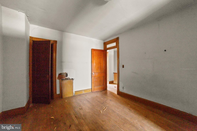 empty room featuring hardwood / wood-style floors