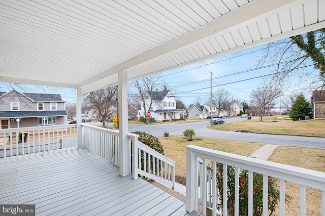 wooden deck featuring a porch