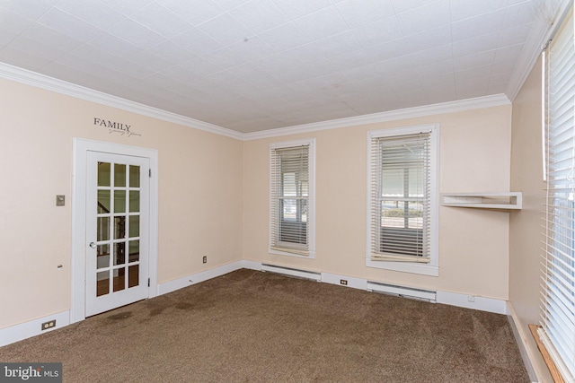 spare room with ornamental molding, carpet, and a baseboard heating unit