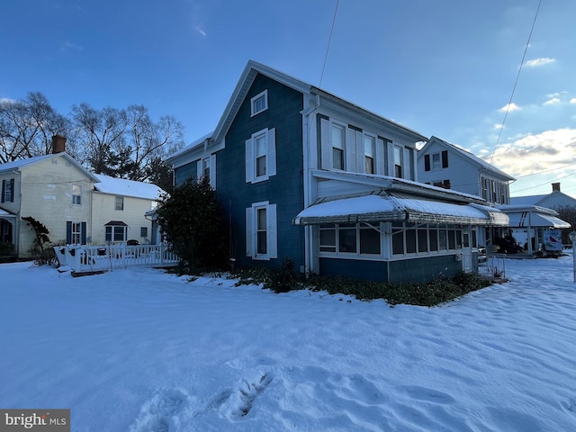 view of snow covered property