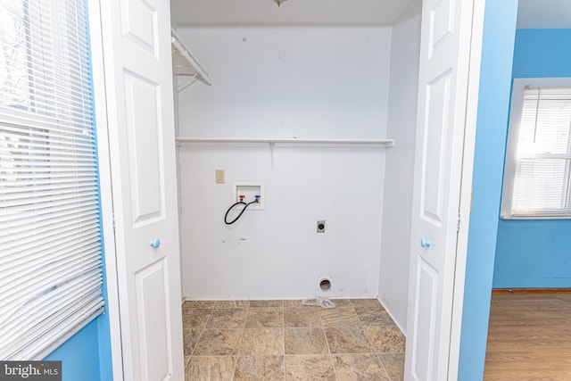 laundry room featuring washer hookup and electric dryer hookup