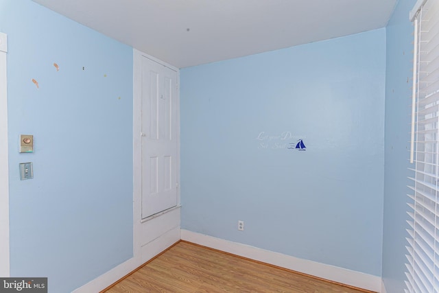 spare room with light wood-type flooring