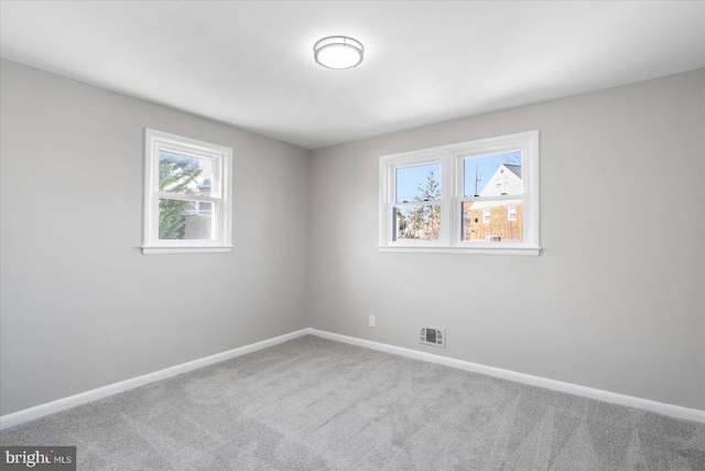 view of carpeted spare room