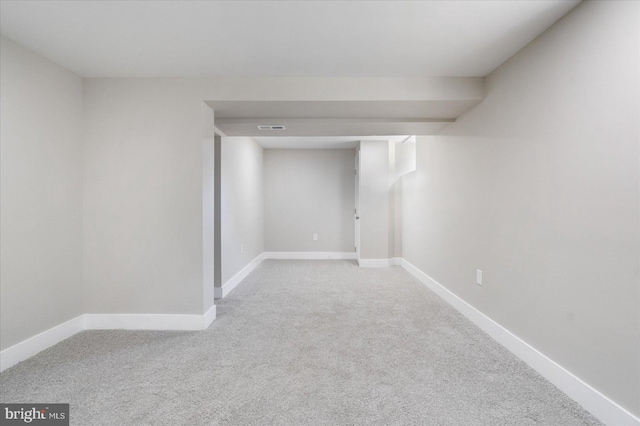 basement featuring carpet floors