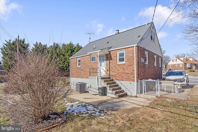 back of house with a patio and cooling unit