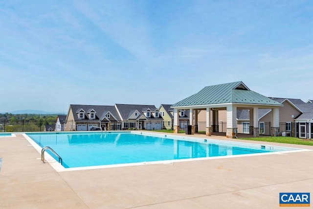 view of pool featuring a gazebo and a patio