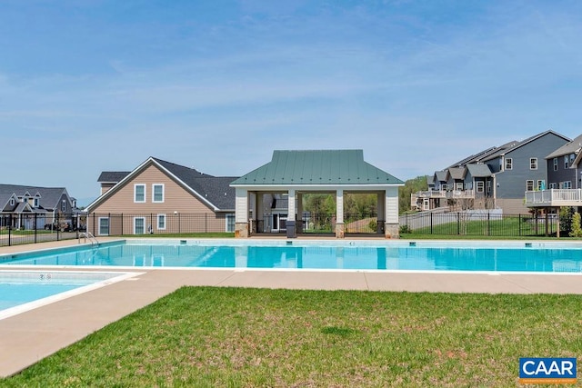 view of pool with a gazebo and a lawn