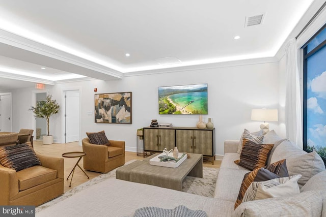 living room featuring crown molding