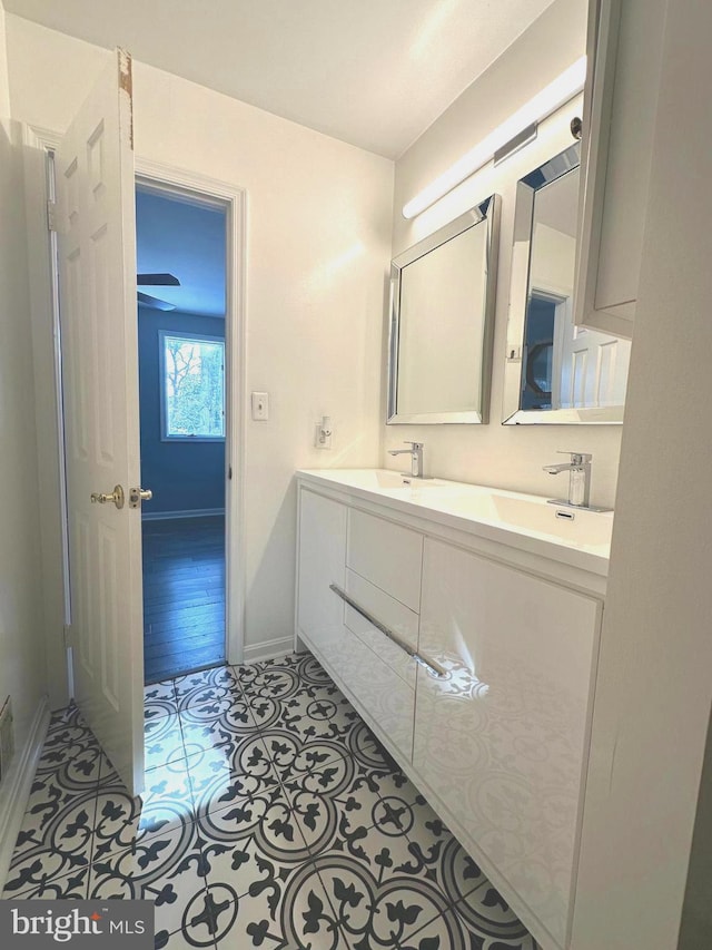 bathroom featuring tile patterned floors and vanity