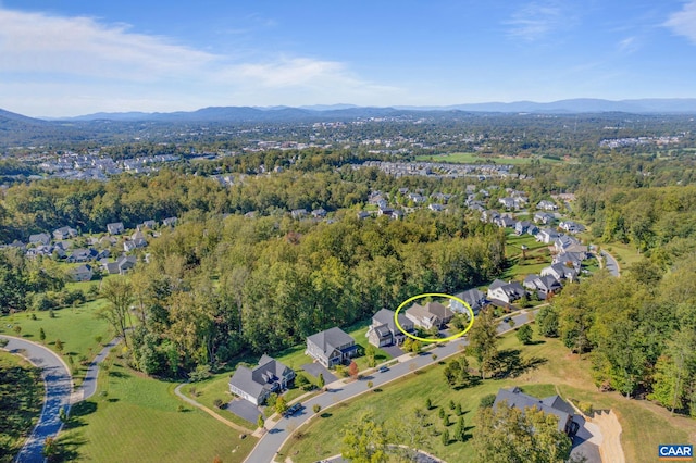 drone / aerial view featuring a mountain view