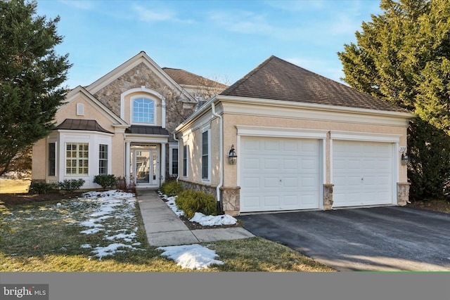 view of front of home featuring a garage