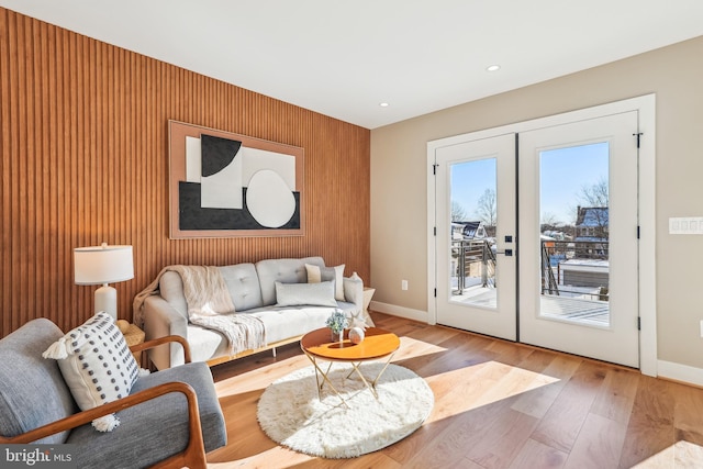 living room featuring french doors and wood-type flooring