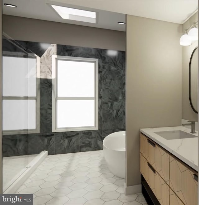 bathroom featuring vanity, a skylight, separate shower and tub, and tile patterned flooring