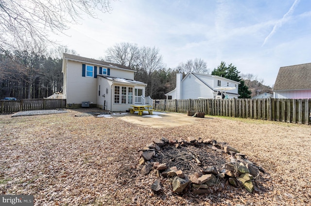 rear view of house featuring a patio