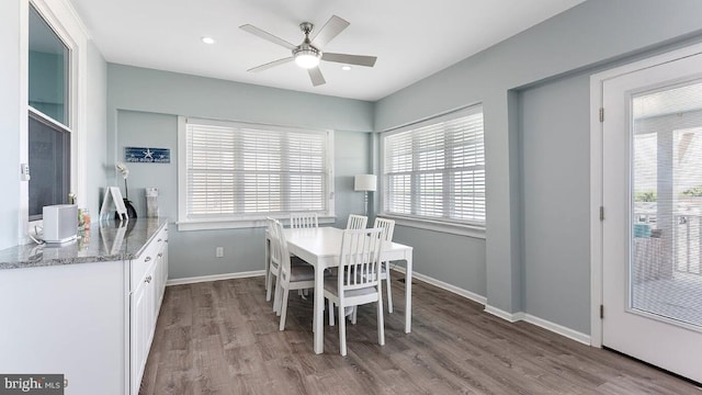 dining area with ceiling fan and light wood-type flooring