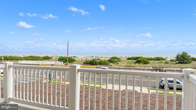 balcony featuring a water view