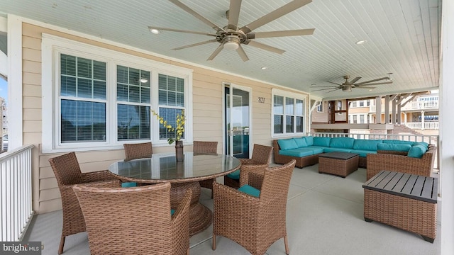 view of patio / terrace with an outdoor living space and ceiling fan