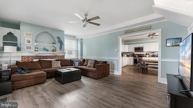 living room with hardwood / wood-style flooring and ceiling fan