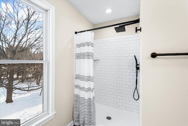 bathroom with a shower with shower curtain