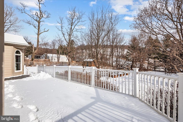 view of snow covered deck