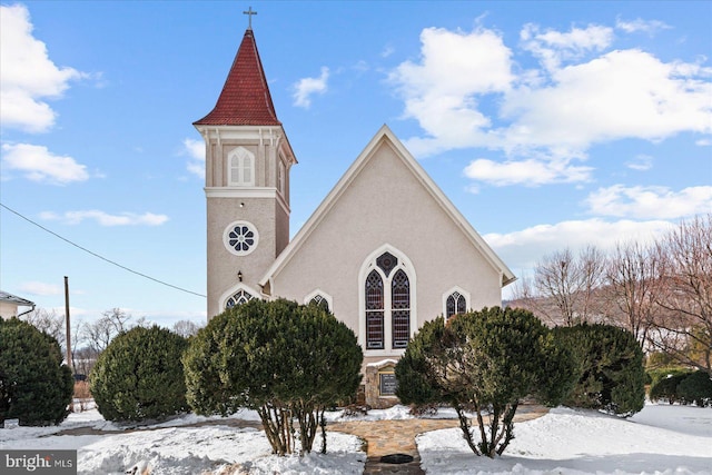 view of snow covered property