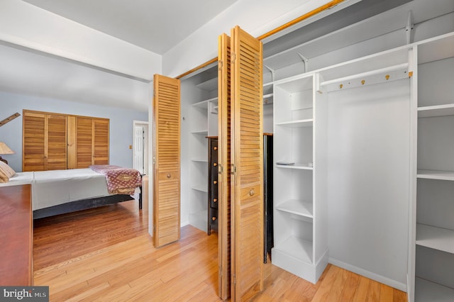 bedroom with hardwood / wood-style floors