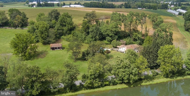 drone / aerial view featuring a water view and a rural view