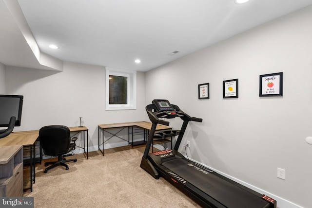 workout area with light carpet