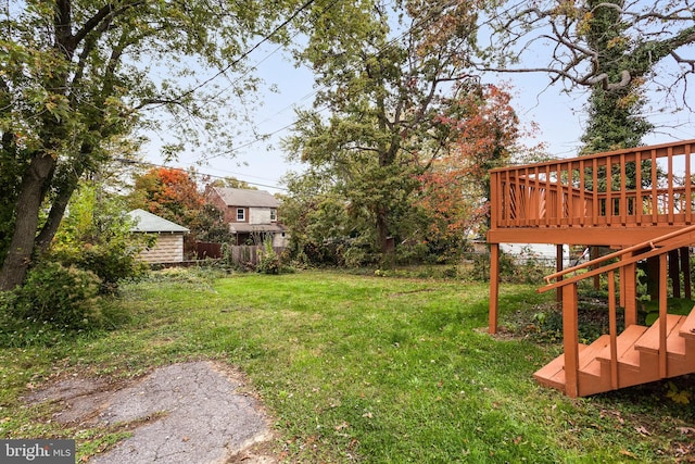 view of yard featuring a deck