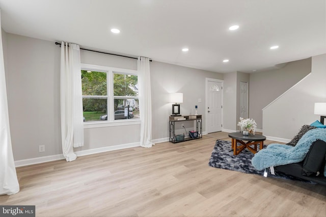 sitting room with light hardwood / wood-style flooring