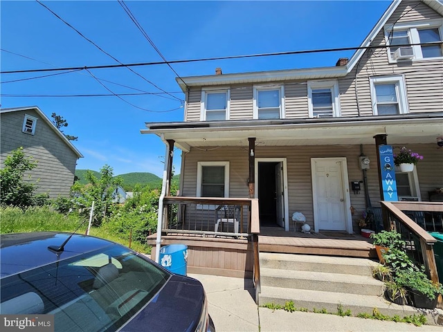 multi unit property featuring covered porch