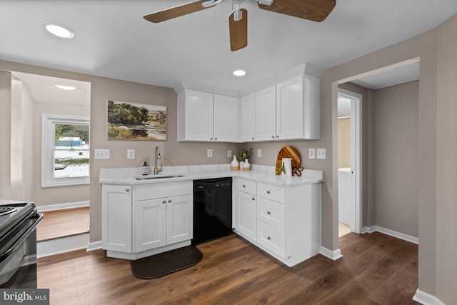 kitchen with light stone countertops, black appliances, white cabinetry, dark hardwood / wood-style flooring, and sink