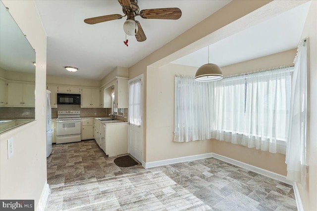 kitchen featuring white appliances, backsplash, sink, ceiling fan, and decorative light fixtures