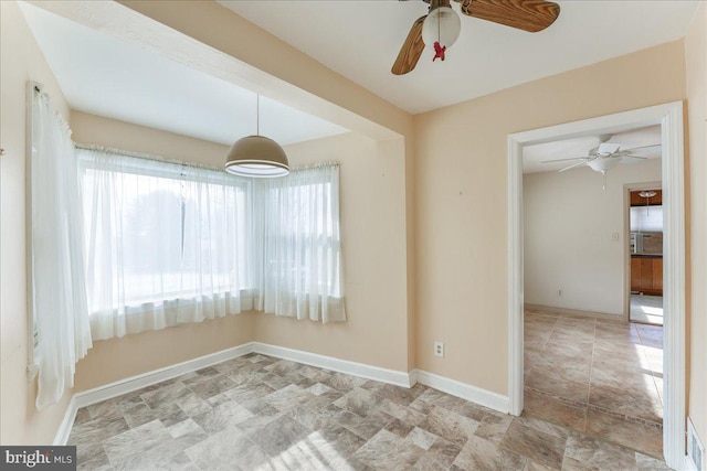 empty room with ceiling fan