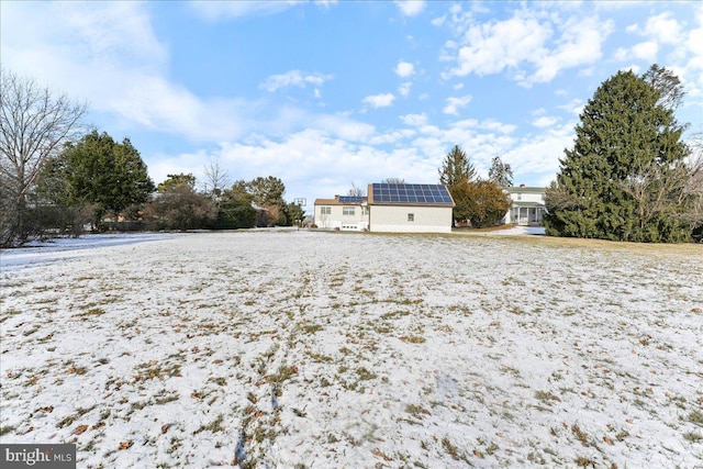 view of yard covered in snow