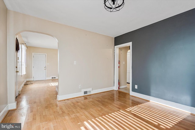 spare room with light wood-type flooring