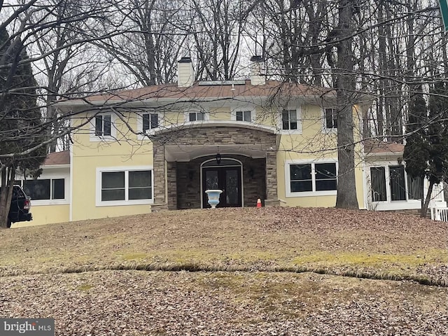 view of front facade featuring french doors