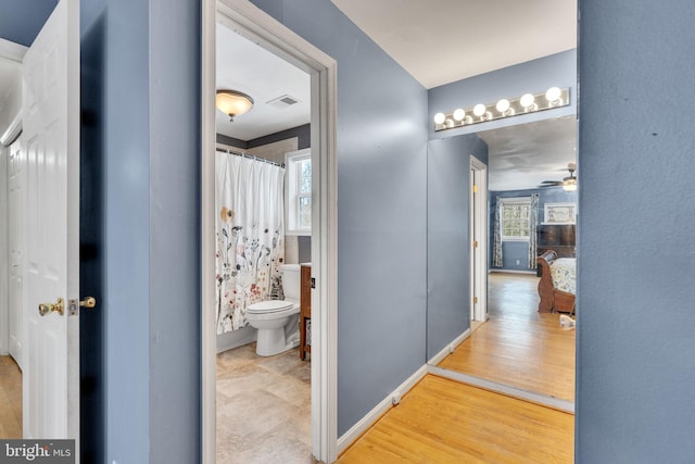 hallway featuring light hardwood / wood-style floors