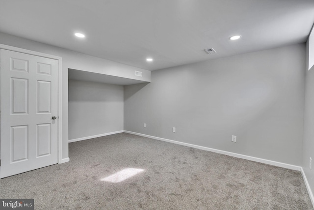 basement with carpet flooring