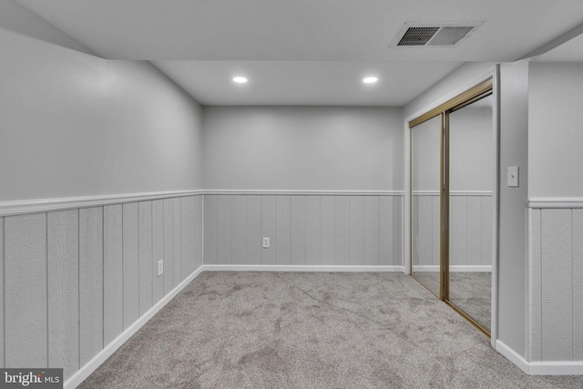 basement with light colored carpet