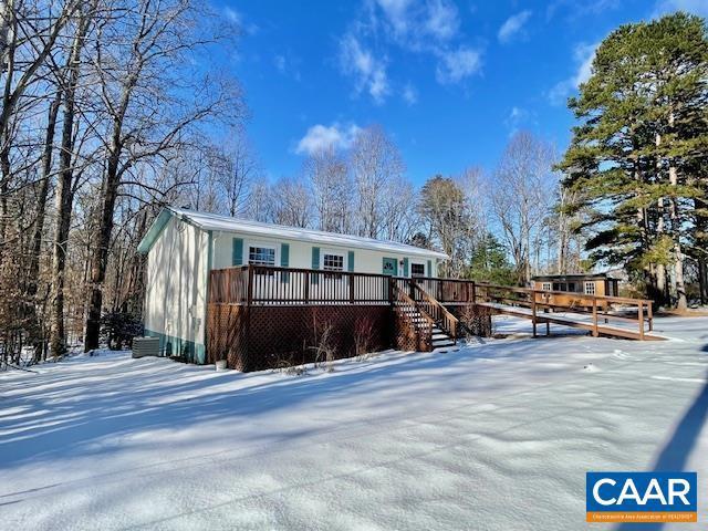 view of front of property featuring a deck