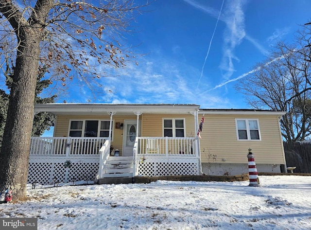 view of front of home featuring covered porch