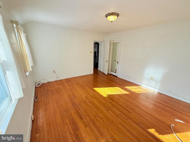 spare room featuring hardwood / wood-style floors