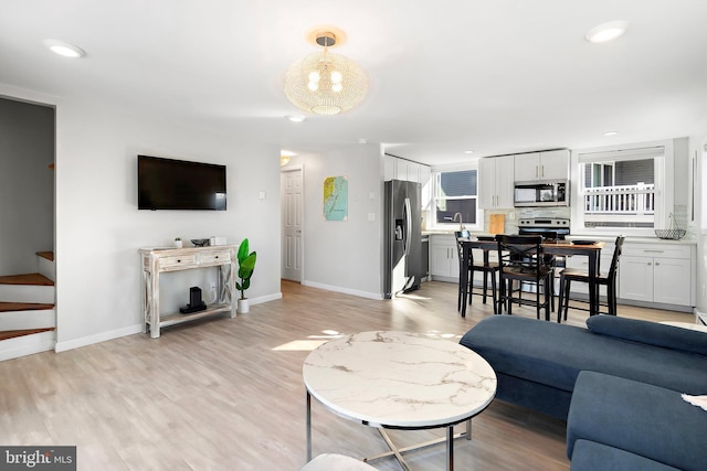 living room with light wood-type flooring